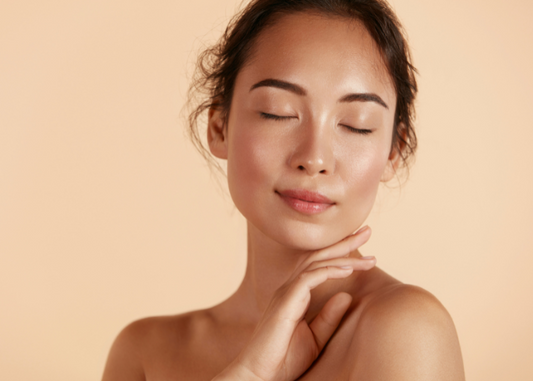 Woman with glowing, natural skin and minimal makeup, embodying a clean girl beauty look with soft, fresh radiance.